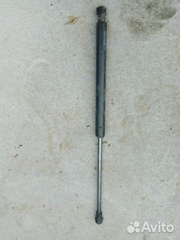 Амортизатор крышки багажника Ниссан Альмера G15