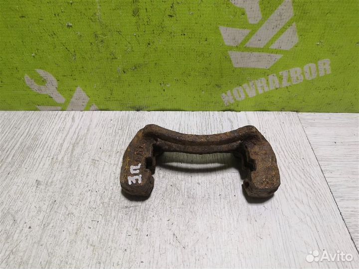 Скоба суппорта заднего Киа Сепия Шума 96-01