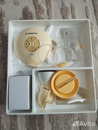 Молокоотсос medela swing flex электрический