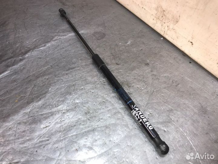 Амортизатор багажника задний левый Renault Sandero