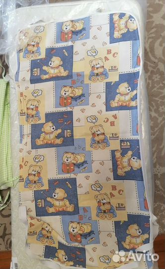 Детская кроватка с продольным маятником