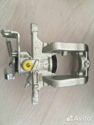 Суппорт тормозной задний левый opel astra J