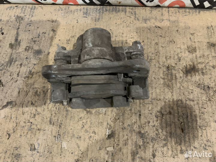 Суппорт задний левый правый Chery Tiggo 3