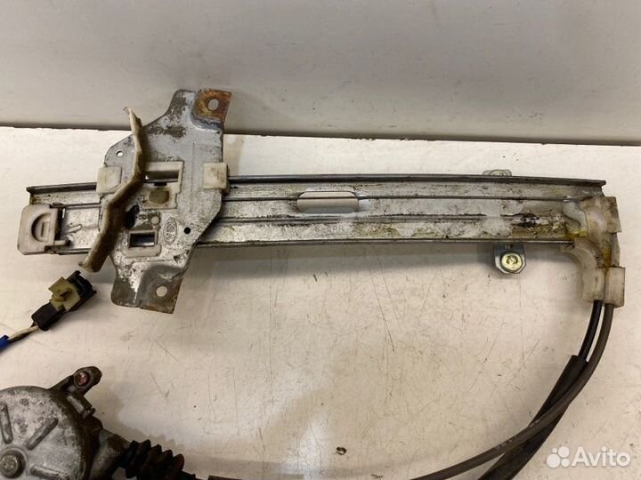 Мотор стеклоподъемника задний правый Kia Spectra