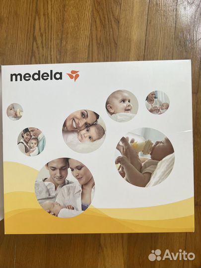 Молокоотсос medela электрический