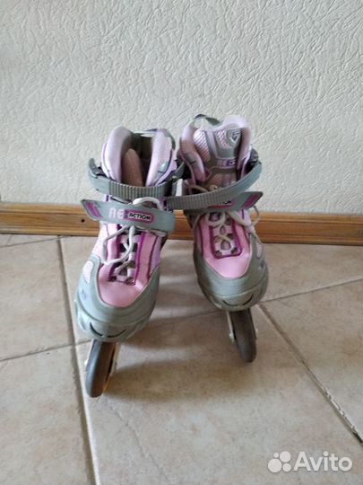 Роликовые коньки