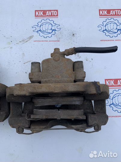 Суппорт тормозной передний правый левый Opel Astra