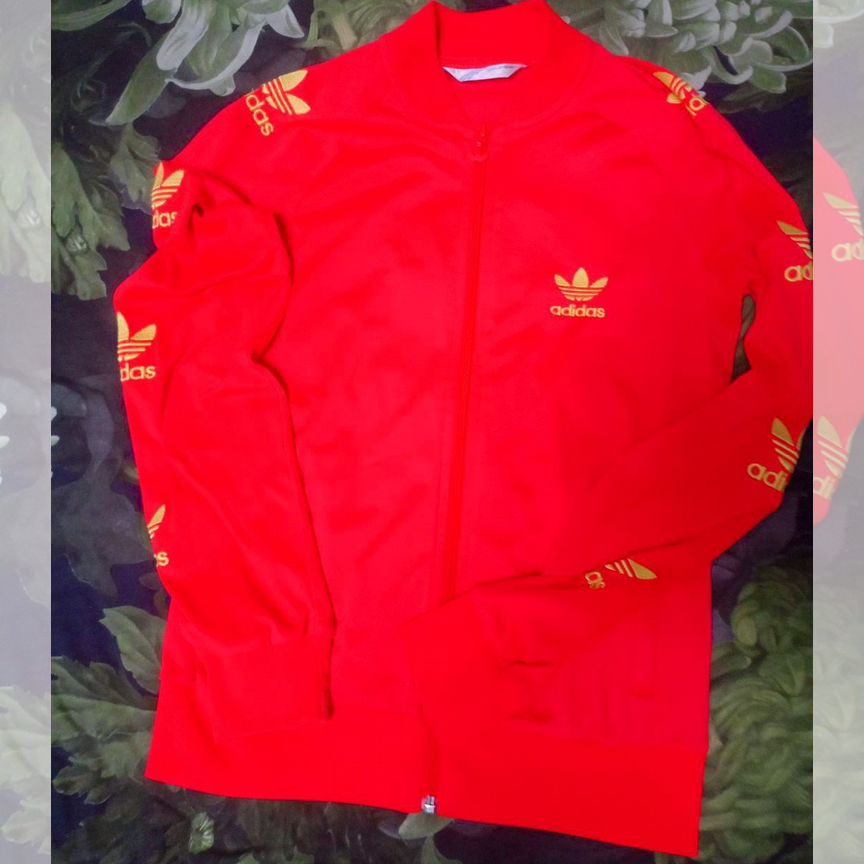 Купить женские оранжевые толстовки и свитшоты бренда Adidas