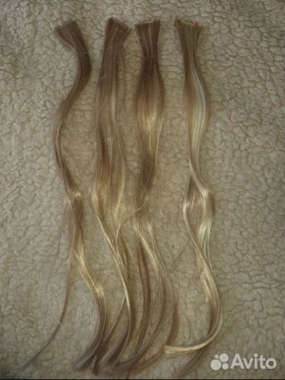 Пряди волос на заколках