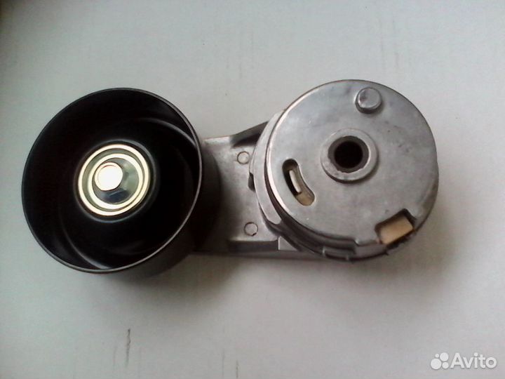 Натяжитель приводного ремня на опель инсигния 2.0