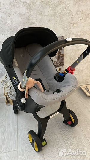 Коляска автолюлька doona