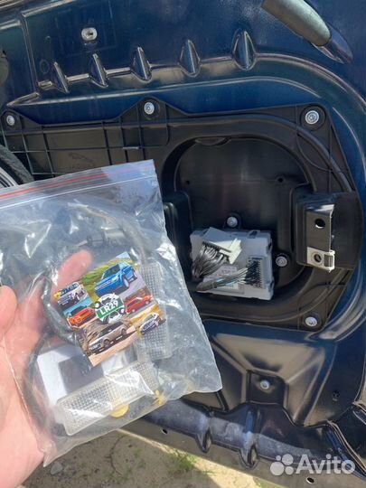 Подсветка передних дверей Jaguar XF