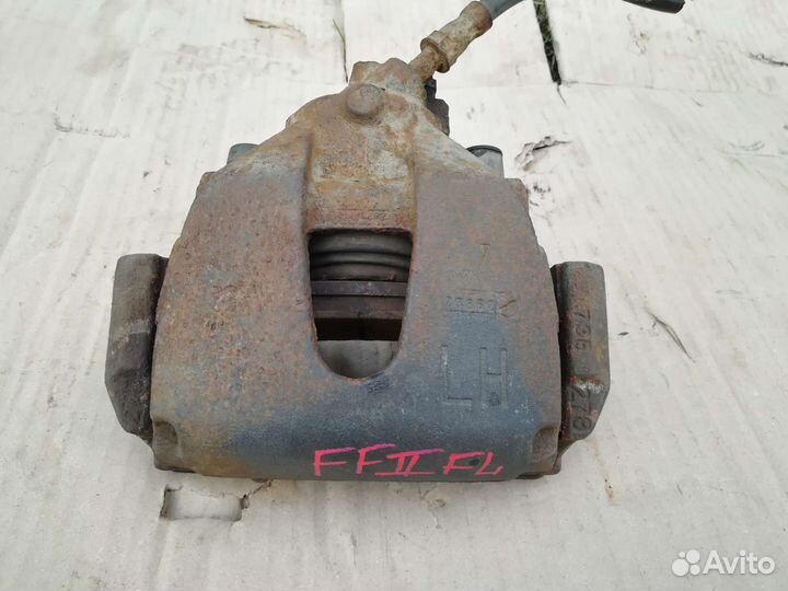 Суппорт тормозной передний левый Ford Focus II
