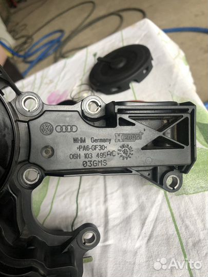 Маслоотделитель б/у VAG 06H103495AC