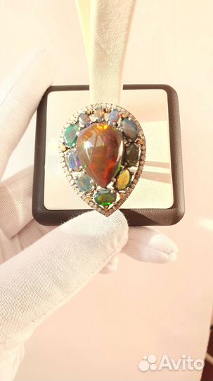 Серебряное кольцо с черными опалами