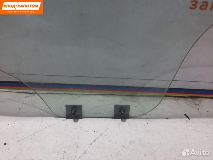 Стекло двери задней левой Renault Logan 8200211930