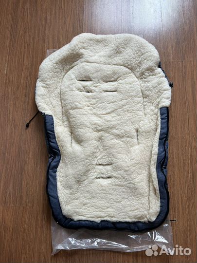 Зимний меховой конверт в коляску