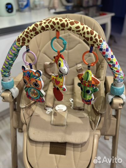 Дуга с игрушками для новорожденных