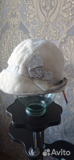 Женские меховые шапки