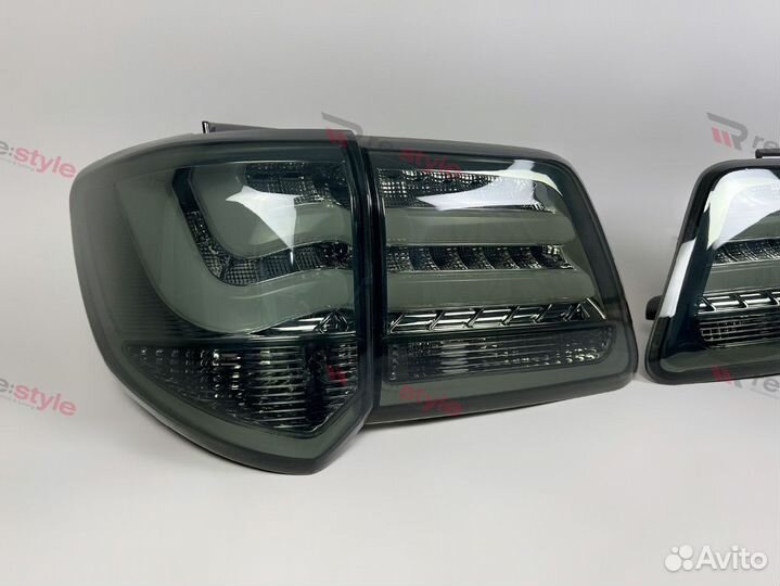 Стопы Toyota Fortuner 11-15г Дымчатые Vland K2430