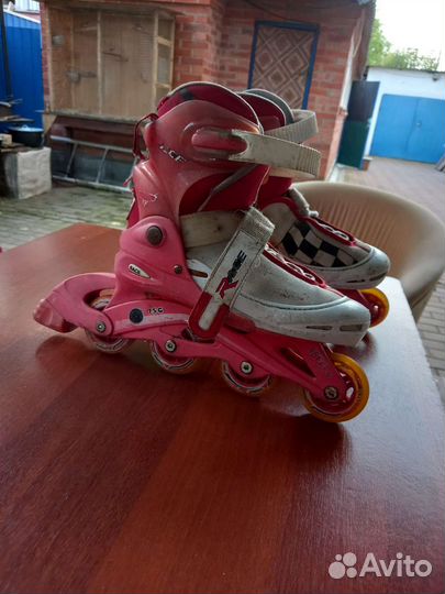 Роликовые коньки