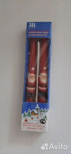 Новогодняя игрушка и свечи и упаковка