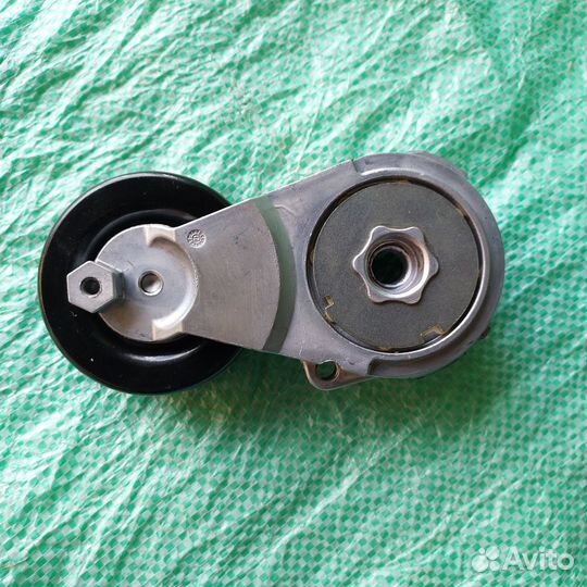 Натяжитель ремня приводного Nissan Qashqai Tiida