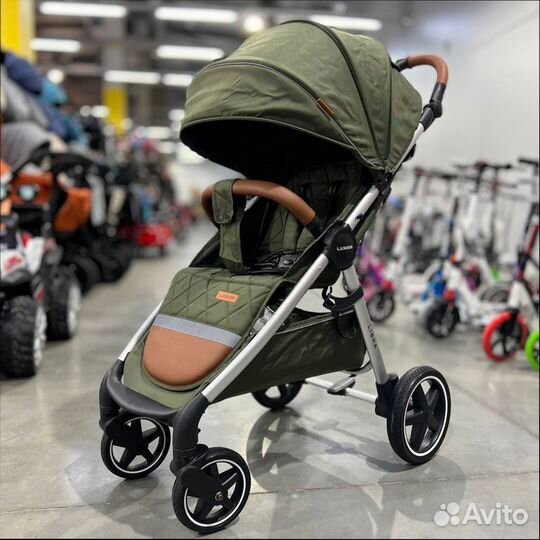 Детская прогулочная коляска Luxmom