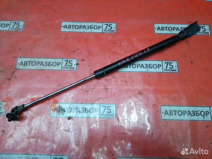 Амортизатор двери багажника левый Toyota Corolla