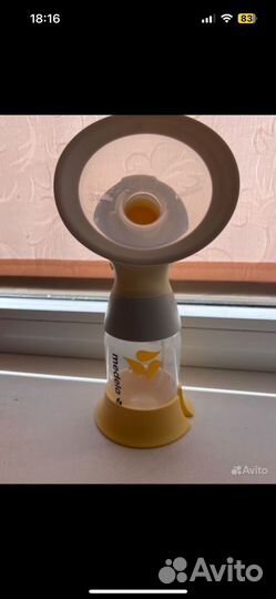 Молокоотсос medela электрический