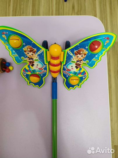 Детская игрушка каталка с ручкой