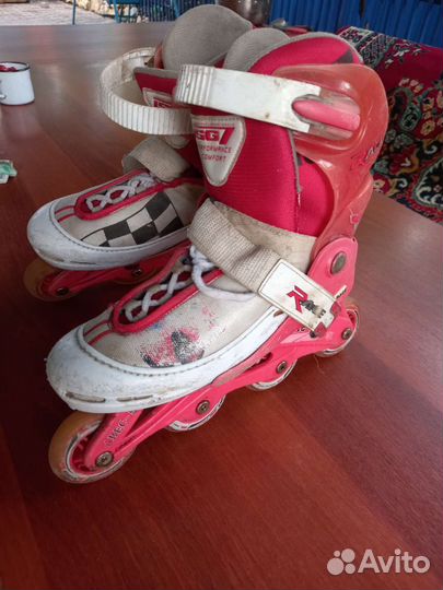 Роликовые коньки