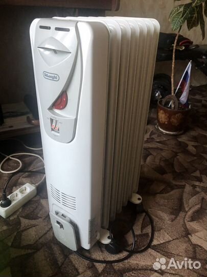 Масляный обогреватель Delonghi
