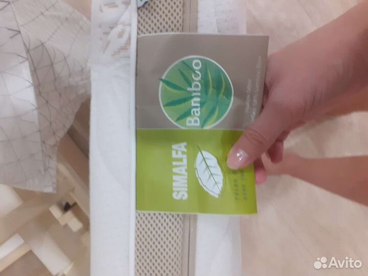 Детская кроватка с продольным маятником