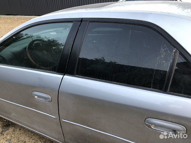 Стекла дверей Кадиллак стс 1