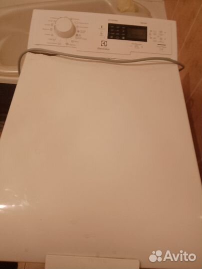 Стиральная машина с вертикальной загрузкой