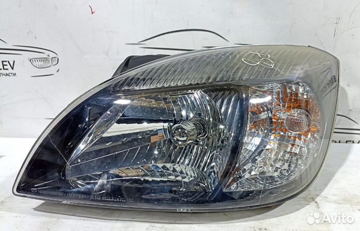 Фара левая (тёмный отражатель) Kia Rio