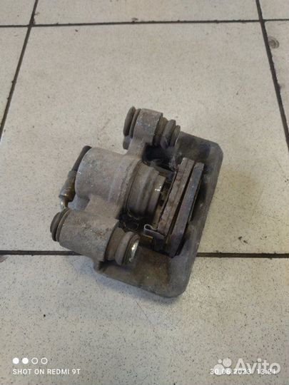 Суппорт тормозной задний левый Chery Tiggo T11