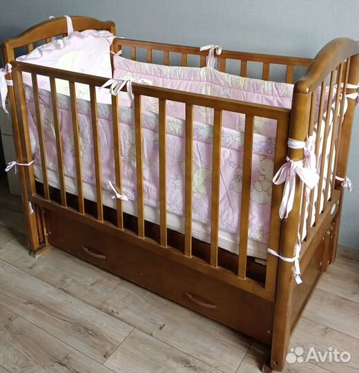 Детская кровать с продольным маятником