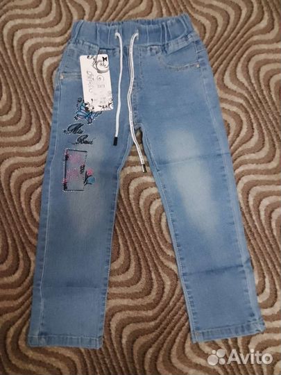 Джинсы новые