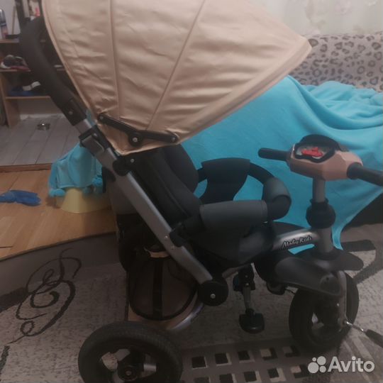 Трехколесный велосипед с ручкой