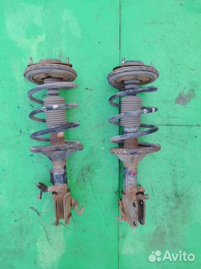 Передние амортизаторы Mitsubishi Grandis