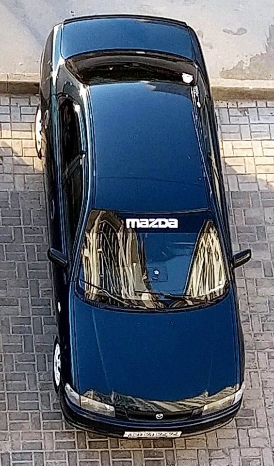 Mazda 323: фото владельца