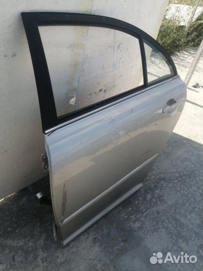 Дверь задняя левая Toyota Avensis AZT250
