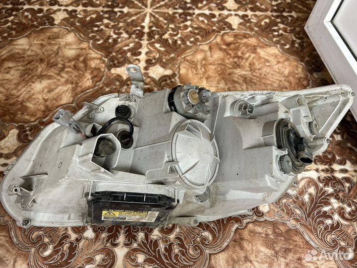 Фара Toyota corolla fielder NZE 141