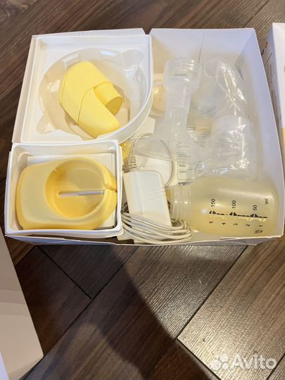 Молокоотсос medela электрический