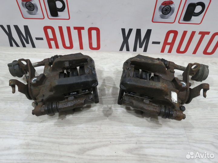 Суппорт задний правый Opel Astra J