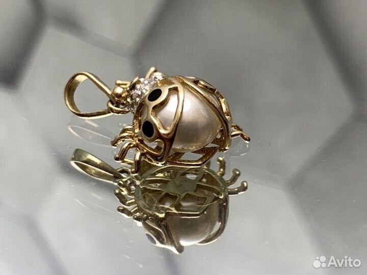 Золотая подвеска 585 пробы массой 3.04 грамма