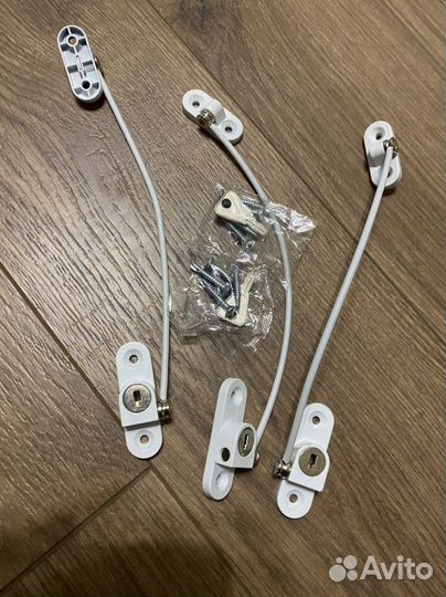 Ограничитель оконный тросовый