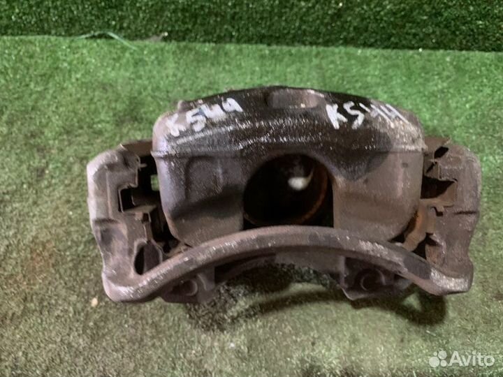 Суппорт тормозной передний правый Nissan Cefiro